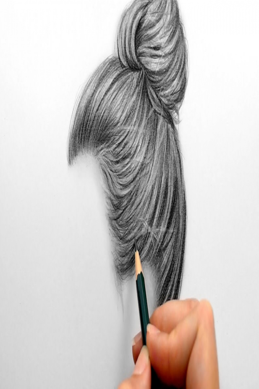 Drawing and shading a realistic hair bun with graphite pencils