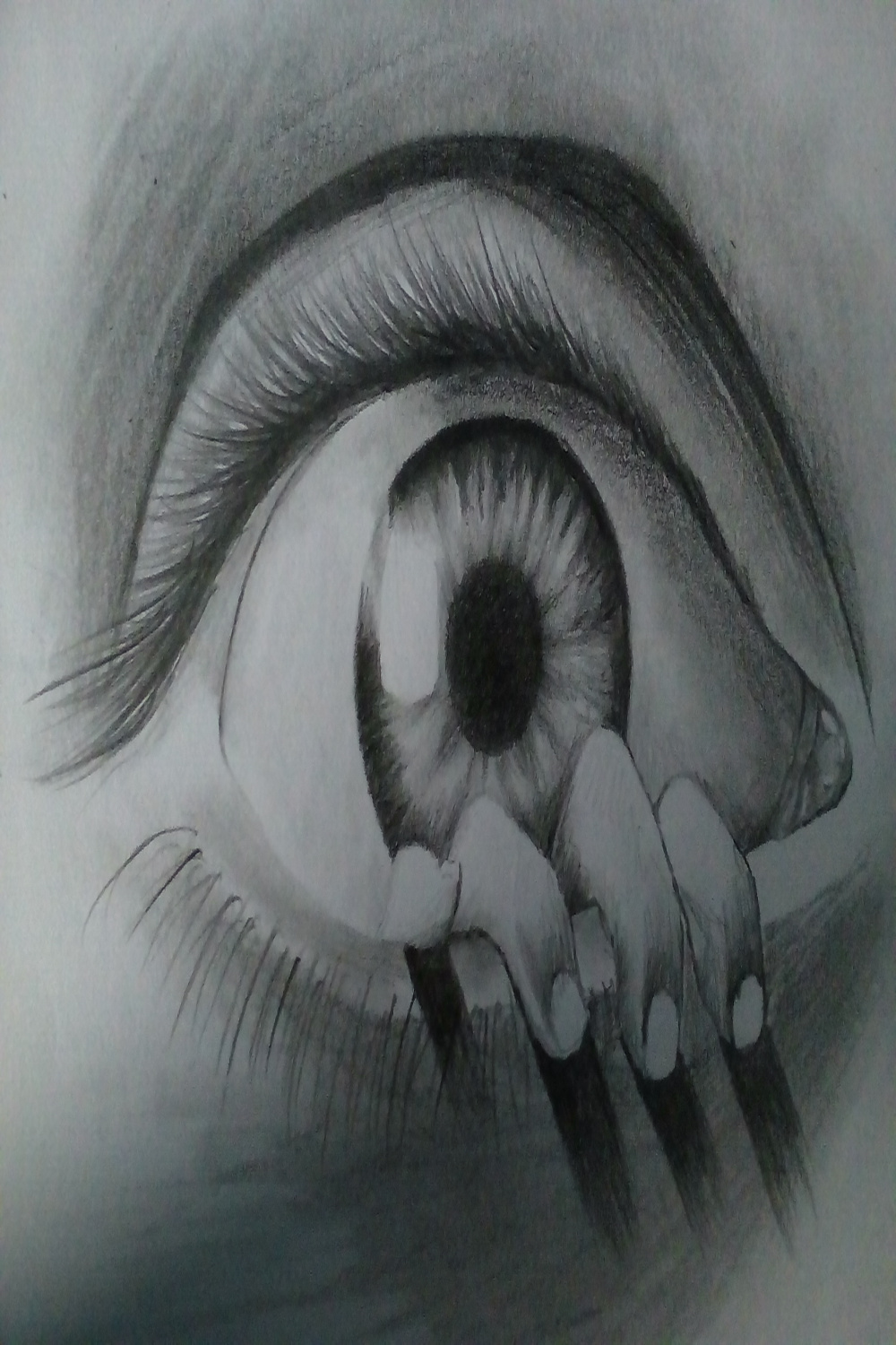 Pencil art-hand coming out of an eye -showing the process step by