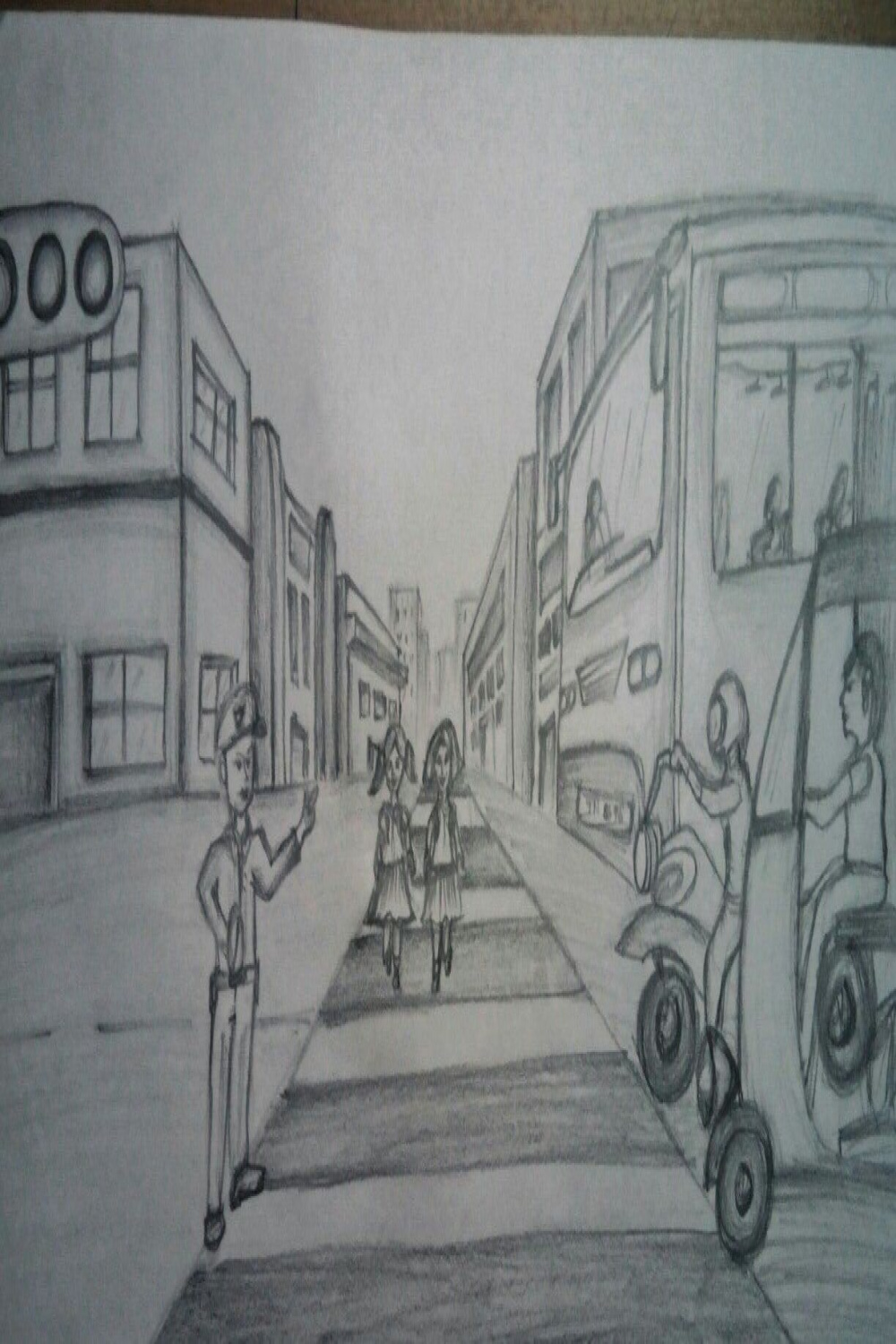 You are standing on a foot path near a pedestrian zebra crossing