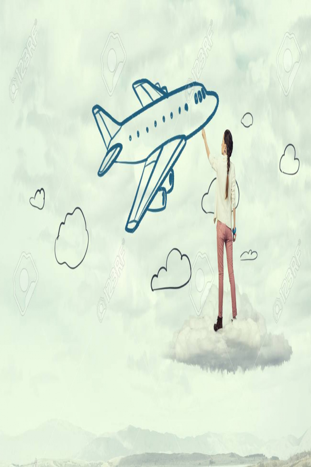 Young Girl Standing With Back And Drawing Airplane In Sky Stock
